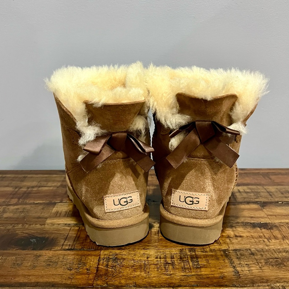 UGG Tan Sheepskin Boots with Dark Brown Bows